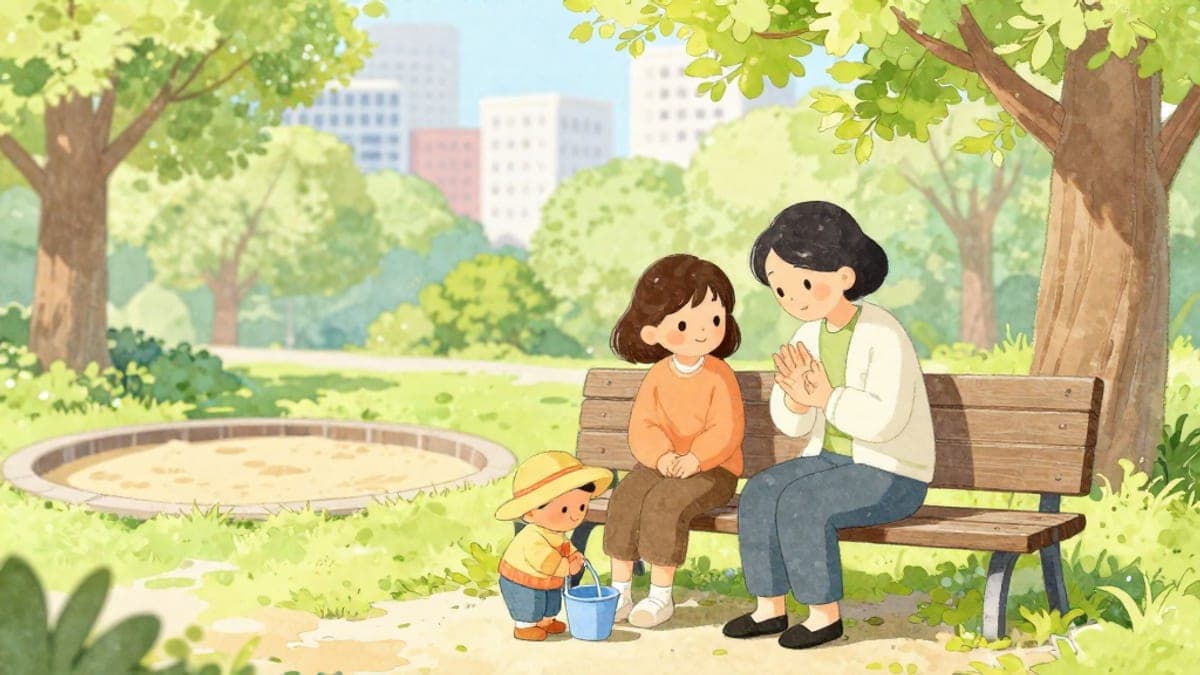 Seorang wanita muda Brazil dan seorang ibu Jepun duduk di bangku taman, ibu menjejak kanji pada tapak tangannya dengan jari manakala seorang kanak-kanak kecil bermain berdekatan.